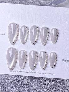 10 Pieces Of Handcrafted Press-On Short Nails, French Tip Nails, False Nails, Pink Nails, Red Nails, White Nails, Gold Nails, Black Nails, Brown Nails, Cat's Eye Nails, Cute Nails, Hand-Painted Gold-Edged Heart-Shaped Reflective Cat's Eye, Sea Star Decoration, Cute And Luxurious Style, Comes With Nail Art Tools, Quick And Easy Wear And Removal, Reusable Almond-Shaped Press-On Nails. - White - View 1