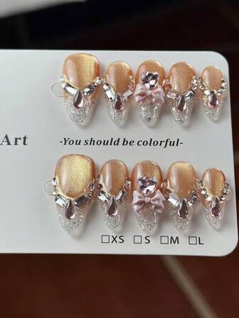 10片装高端性感风格美甲贴片，公主范儿十足，蝴蝶结猫眼设计，闪耀立体粉钻手工法式美甲，适合重要舞会、朋友生日派对、情人节和圣诞节等场合。