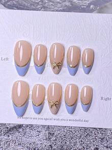 10pcs Handmade French Short Nail Stickers. This Nail Art Set Includes 5 Colors: White, Pink, Gold, Blue, And Yellow, With A Charming And Adorable Design. Each Nail Sticker Is Decorated With Hand-Painted Vine Patterns That Wind Along The Metallic-Feeling French Edges. Nails Nail Supplies Handmade Press On Nails - Blue - View 3