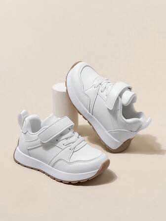 1 par de zapatillas casuales blancas para niños y niñas, de diseño sencillo, de moda y versátiles