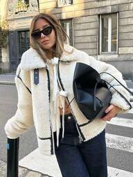 Manteau épais élégant pour femme, style streetwear. Manteau d'hiver pour femmes avec col, manches longues, poches, zip et décorations. Style casual