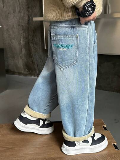 男童宽松保暖加厚牛仔裤，适合秋冬季休闲、上学、户外活动穿着。