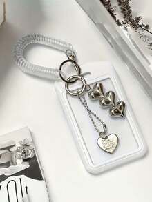 可扩展心形卡包钥匙扣，配黑白心形吊坠，耐用时尚，女士配饰，可爱实用塑料设计钥匙扣，校园必备，时尚钥匙扣配金属心形吊坠，适用于身份证、信用卡、交通卡和钥匙。 - 彩色 - 查看 5