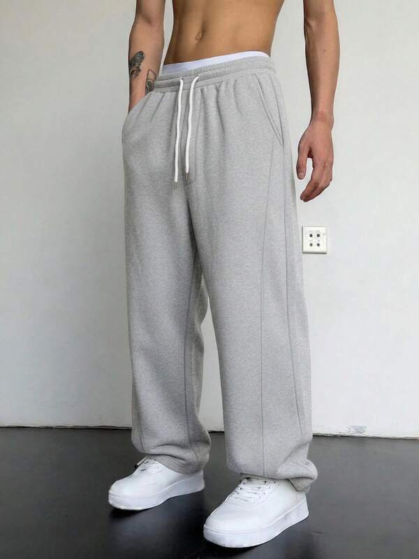 Pantalones rectos y anchos para hombres, pantalones casuales sueltos con cordón y cintura elástica, pantalones de chándal para primavera y otoño