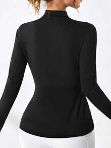 Camiseta deportiva para mujer con agujero para el pulgar, top de yoga de manga larga con media cremallera, camiseta deportiva sin costuras con tela suave y elástica, estampado con agujero para el pulgar, apta para yoga, pilates, fitness, running y entrenamiento, de alta elasticidad y piel amigable, color negro, primavera - Negro - Ver 4