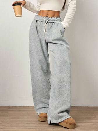 加大码女式纯色抽绳裤腿开衩休闲裤