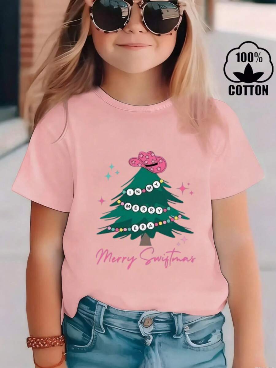 Esta nueva y moderna camiseta de manga corta 100 % algodón para niña luce un estampado navideño. Esta camiseta holgada, informal y versátil está confeccionada con un tejido suave y agradable para la piel de tu bebé. Ya sea para una reunión familiar, un evento escolar o una salida para jugar al aire libre, esta camiseta permite que tu hija se mueva con libertad y comodidad. - Rosa - Ver 1