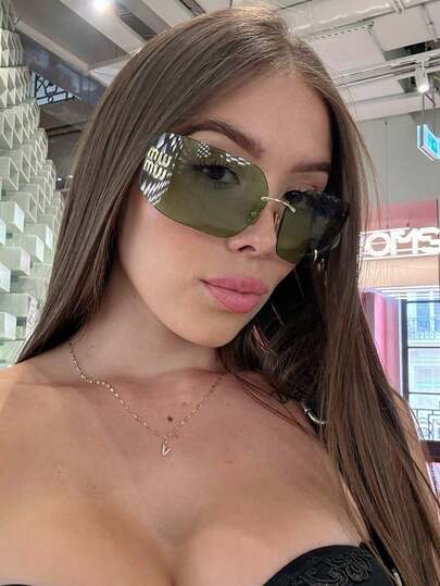 一副复古超大无框女士眼镜，时尚百搭，休闲百搭，适合女性佩戴，是街头风、度假、旅行、海滩、驾驶等场合的理想之选。