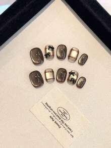 10pcs Handmade Giant Starry Sky Cat Eye Plaid 3D Bow Nail Stickers, Suitable For Women And Girls' Daily Life, Parties, Balls, And Gifting To Friends. The Acrylic Nail Stickers Are Simple, Cute, And Versatile. The Short Nail Sticker Set Includes Jelly Gel And Anti-Slip Stickers.