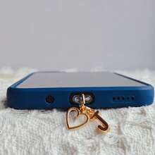 A Minimalist Golden Charm Phone Dust Plug Featuring The 26 Letters Of The Alphabet And A Heart Shape - A-Z Letter Pendant Stylish Heart-Shaped Charging Port Dust Cover, Compatible With Iphone/Type-C Interface, Perfect For Birthday And Holiday Gifts. - Multicolor - View 9
