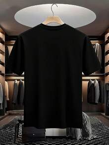 Camiseta de Hombre con Tema de Fútbol de Santa Claus de Dibujos Animados de Feliz Navidad - Diseño de Cuello Redondo Casual, Ligera y Cómoda, Adecuada para Uso en Verano | Ropa de moda urbana de verano | Clásico negro y blanco, azul marino, gris, cuatro colores | Estilo casual ligero y transpirable para todas las estaciones | Top Deportivo de Secado Rápido para Exteriores - Negro - Ver 2