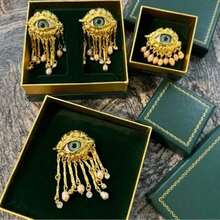 A Fashionable New Retro Evil Eye Tassel Earring, A Light Luxury Creative And Niche Design For Women's Earrings - Vàng - Xem 2