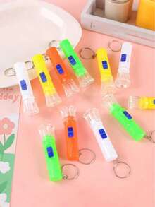 12个装 - 2.8英寸迷你手电筒,LED照明,实用礼品钥匙扣LED吊坠,颜色随机:橙色、黄色、绿色和白色。生日派对礼物、家庭奖励、课堂奖品和返校礼物、婴儿派对礼物,深受男孩女孩喜爱,可用作皮纳塔填充物 - (4种随机颜色)不可充电,电池供电! - 彩色 - 查看 11