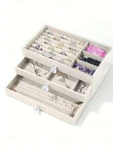 1个优雅三层首饰收纳盒，带抽屉 - 长方形布艺耳环架，防尘展示盒，完美的家居装饰品。男女皆宜。天鹅绒抽屉美观且品质上乘。精致的水晶拉手方便取用三个隔层中的首饰，整齐收纳耳环、项链和戒指。 - 彩色 - 查看 15