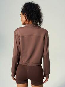 UONNOU 1 pezzo Felpa casual sportiva da donna con piccolo colletto a camicia e zip semi-aperta sul davanti, con tasca frontale a tutta lunghezza, design con foro per il pollice per maggiore movimento, tessuto morbido e confortevole. Questa felpa delicata e che valorizza la figura offre una vestibilità rilassata ma snellente, perfetta per sport all'aperto, jogging, allenamenti e uscite casual quotidiane. Disponibile in stili autunnali e invernali