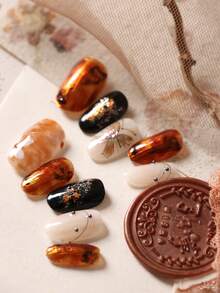 10片装亚克力美甲贴片，黑色、金色、亮棕色可选，蝴蝶花朵图案，短款，包含1张粘性贴片和1个迷你指甲锉。 - 彩色 - 查看 3