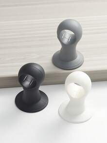 Made Of Silica Gel, It Operates With Low Noise. Equipped With An Adjustable Strap For Anti-Collision And A Strong Suction Cup, This Door Stopper Is Suitable For Use In School Dormitories, Offices, And Homes.