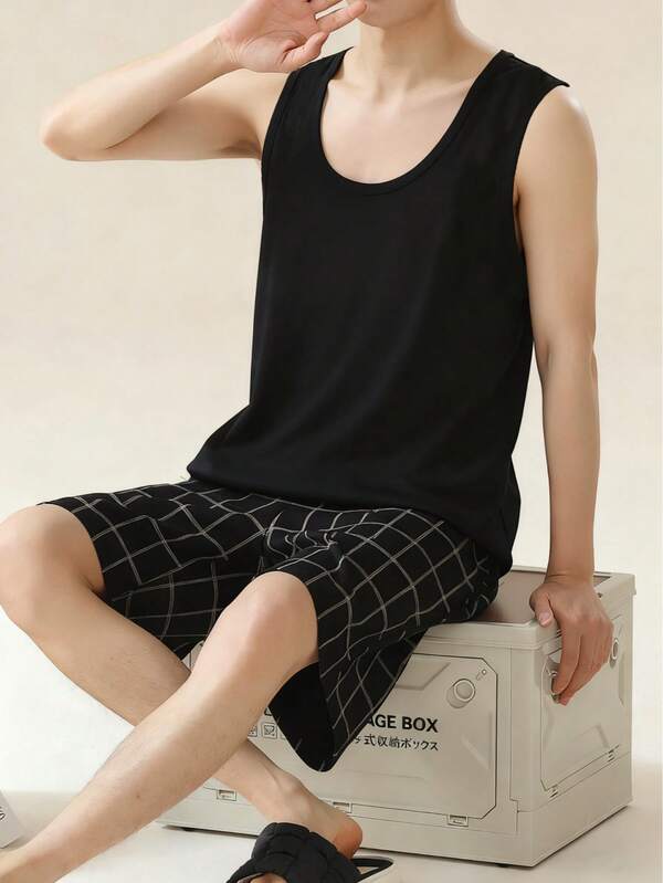 AICJ 男士纯色休闲宽松基础款圆领背心上衣和格子短裤睡衣套装（2件套），适合春夏居家休闲或外穿。