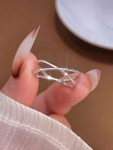 1枚优雅蓝宝石戒指，925纯银材质，适合日常佩戴和约会。 - 交叉戒指 - 查看 6