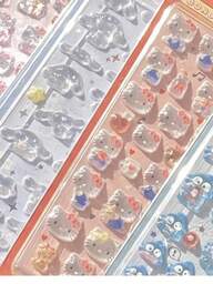 1個 かわいいメロディーアニメのステッカー 可愛い3Dステレオ DIY ハンドメイド 携帯電話の装飾ステッカー、女の子へのプレゼント、ランダムカラースタイル