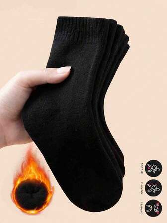 2双随机黑白条纹加厚保暖袜，简约百搭，适合秋冬季节。