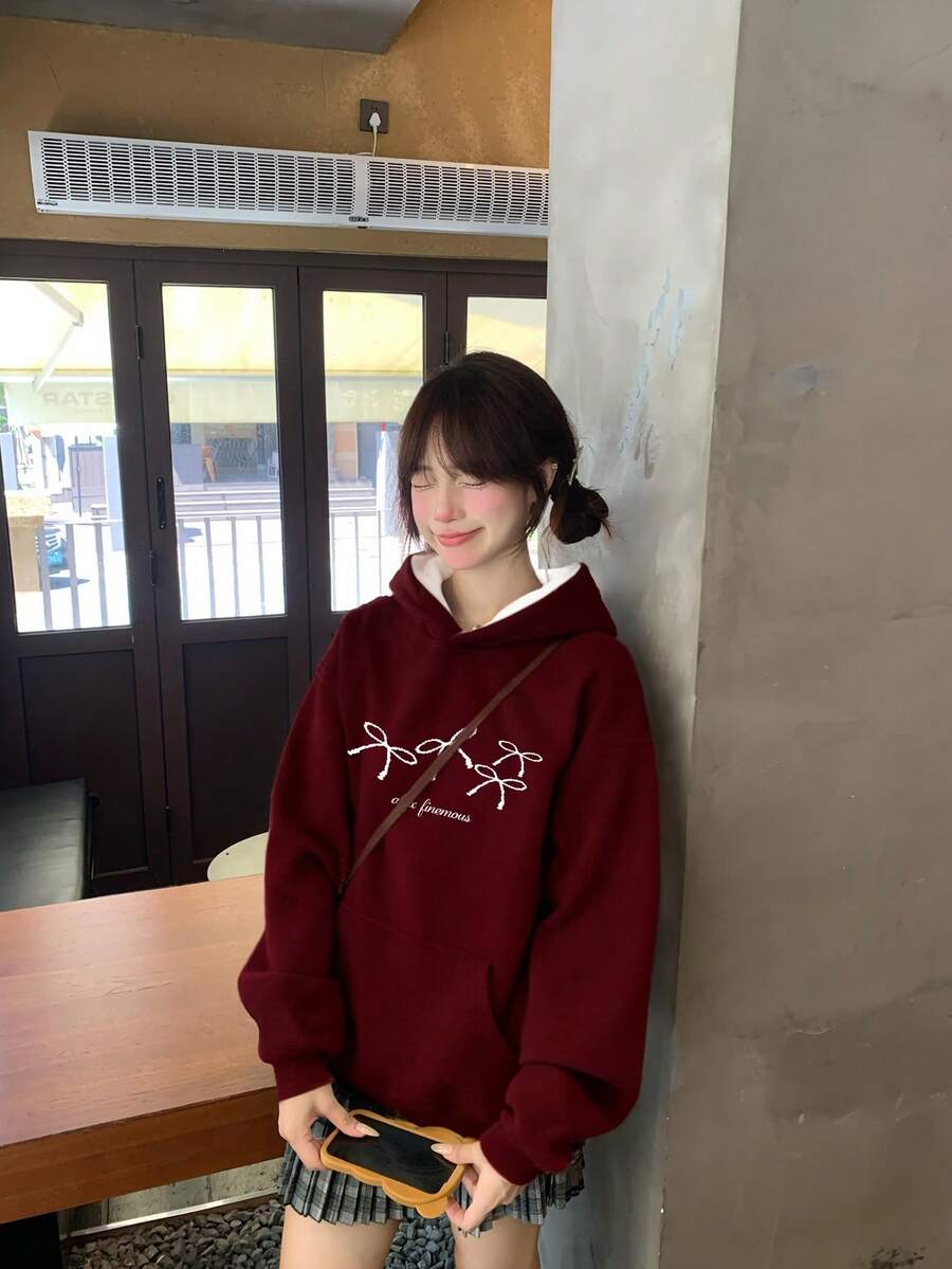 秋冬季美式宽松酒红色女式卫衣，简约独特蝴蝶印花上衣