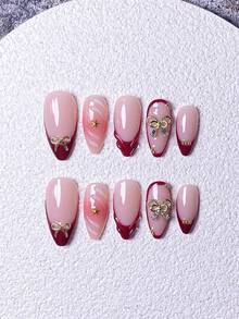 Conjunto com 10 adesivos de unhas postiças prensadas à mão, incluindo unhas curtas, unhas falsas, francesinhas, unhas amendoadas, unhas brancas, vermelhas, rosas, azuis, douradas, olho de gato, unhas fofas, unhas para o Dia dos Namorados e unhas para o Ano Novo. Decoradas com laço dourado e enfeites de floco de neve na superfície. Acompanha kit de aplicação, fácil de colocar e remover. Ideal para mulheres e meninas que gostam de unhas amendoadas. - Vermelho - Ver 2