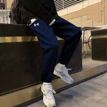 Under Armour 男子新款修身舒適透氣簡約健身訓練隊運動針織長褲