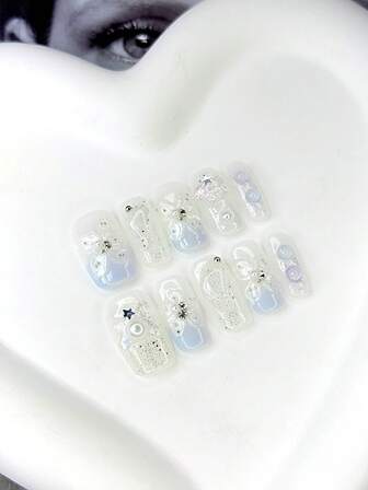 10 piezas de uñas postizas cuadradas con bases transparentes, azul claro, iridiscentes y otros tonos soñadores, elementos brillantes, decoración 3D (con acento de rhinestone), diseños con patrones de estrellas y efecto degradado, uñas acrílicas brillantes 100% hechas a mano, suministros de uñas reutilizables para uso diario o de fiesta para mujeres