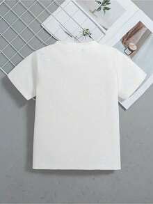 Esta elegante y nueva camiseta de manga corta para niña, 100 % algodón, luce un bonito estampado de corazones. Hecha de tela suave, esta camiseta holgada y versátil es cómoda y agradable al tacto. Ya sea para una reunión familiar, una actividad escolar o para jugar, esta camiseta permite que tu hija se mueva con libertad y comodidad. - Blanco - Ver 2