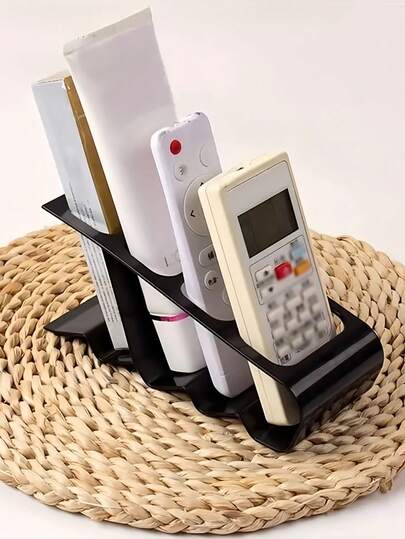 4-Fach Fernbedienungshalter, robuster Kunststoff schlanker schwarzer Schreibtischorganizer mit ergonomischem Design für 4 Fernbedienungen, platzsparender Fernsehtisch Aufbewahrungsständer für Homeoffice, Fernbedienungsorganizer, Heimorganisation, minimalistisches Regal, praktische Aufbewahrung, Mehrgitteraufbewahrung, für Fernarbeiter