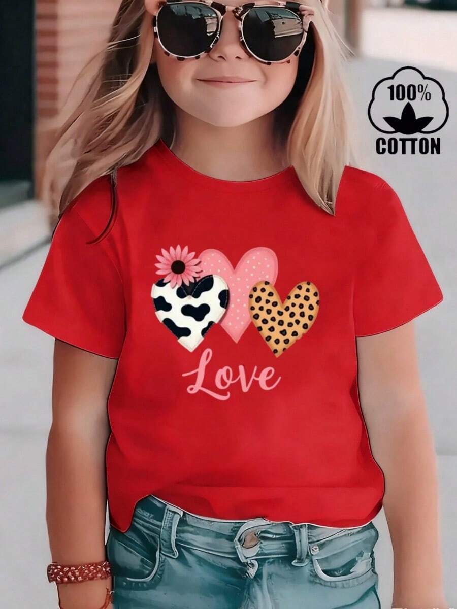 Esta elegante y nueva camiseta de manga corta para niña, 100 % algodón, luce un bonito estampado de corazones. Hecha de tela suave, esta camiseta holgada y versátil es cómoda y agradable al tacto. Ya sea para una reunión familiar, una actividad escolar o para jugar, esta camiseta permite que tu hija se mueva con libertad y comodidad. - Rojo - Ver 1