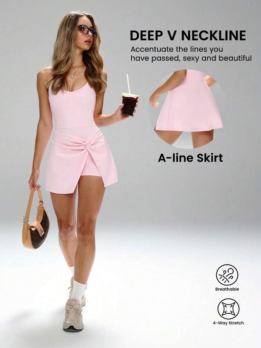 Bralette desmontable y pantalones cortos con falda y control de abdomen, Vestido versátil de yoga a calle con diseño anti-transparencia, Diseño femenino con torsión frontal, Modesto pero sexy, Detalle de cintura cruzada y pantalones cortos con falda que rozan las caderas, Cobertura total y confianza, Movimiento libre para yoga/pilates, #GimnasioAPartyEnJardín #RopaDeportivaFemenina #ModestoPeroSexy, Vestido de entrenamiento con torsión frontal, Vestido deportivo con falda, Listo para cena romántica, Adelgaza caderas, Vestido deportivo elegante - Rosa Pálido - Ver 1