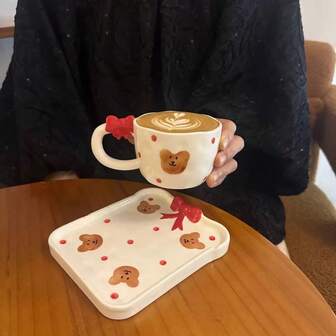 1 Set Ceramic Cup With Saucer, Featuring Bowknot Bear, Polka Dots, Flowers, And Various Bear Patterns, 220ml (7.44oz) Romantic & Cute Style Mug For GAsymmetrical Asymmetrical Art Design, Suitable For Breakfast, Milk, Afternoon Tea, Party, Christmas Gift
