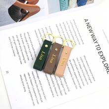 1个定制周年纪念姓名或字母PU皮革女士包包睫毛钥匙扣，精致小巧的ins风高端质感，简约复古法式风格，多功能烫印字母PU皮革防损腕带钥匙扣包包睫毛配饰，可作为生日礼物、周年纪念礼物、结婚礼物，个性化独特，适合通勤和日常佩戴 - 無色 - 查看 6