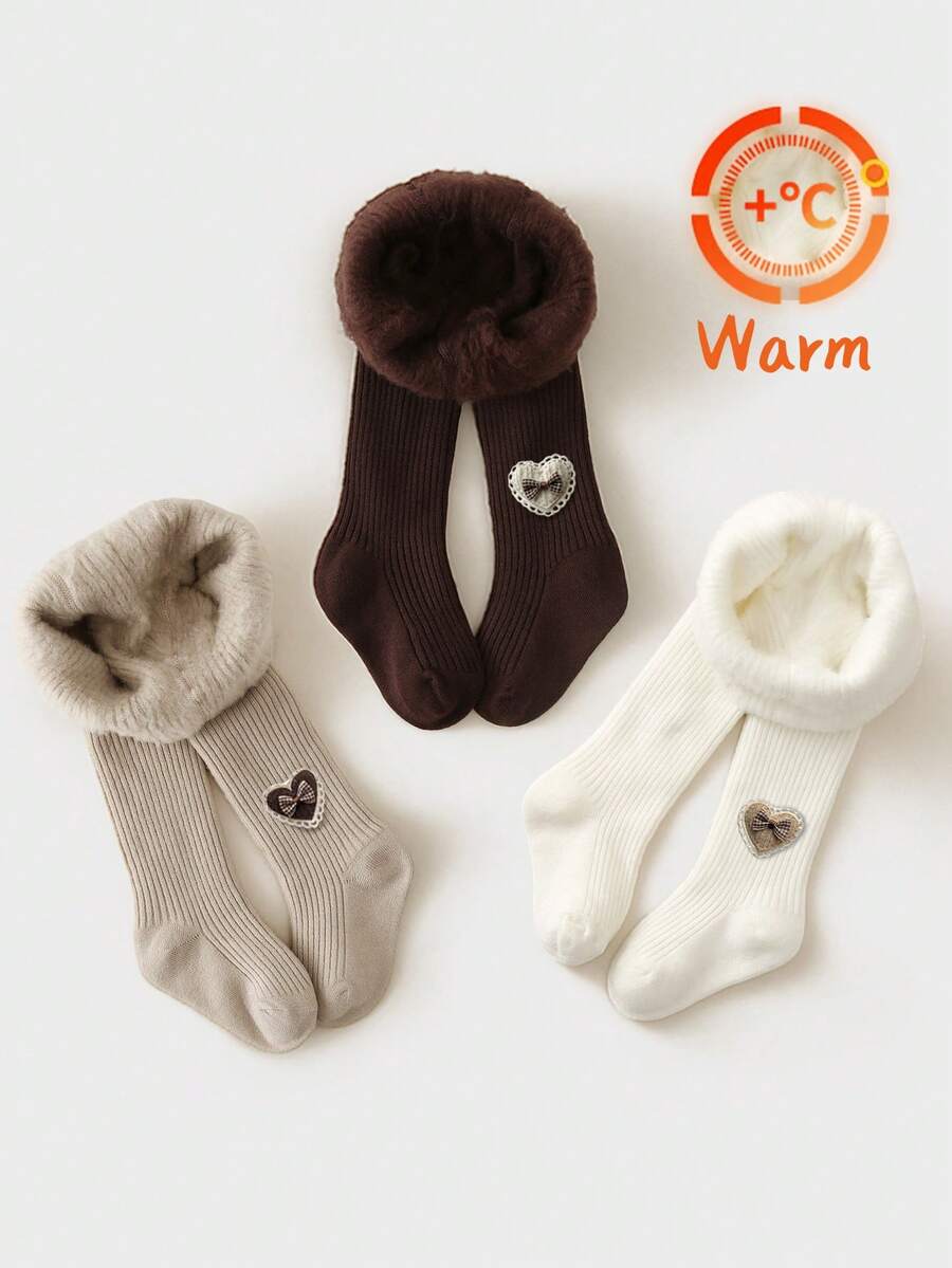 3条装秋冬季女童/婴幼儿保暖连裤袜,纯色条纹,饰有爱心和蝴蝶结图案,经典简约保暖打底裤,柔软舒适保暖内衬,适合日常、度假、上学穿着,颜色随机。 - 彩色 - 查看 1
