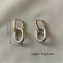 Pendientes colgantes de cadena de dos tonos de estilo minimalista. Cadena simple en dorado y plateado que combina con atuendos diarios y accesorios de fiesta. Joyería de moda.