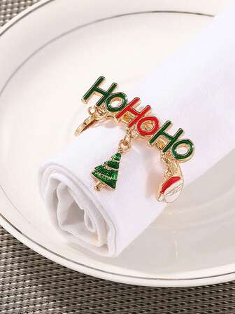 Christmas Reindeer Napkin Rings, แหวนรองผ้าเช็ดปากตัวอักษรลายคริสต์มาสสร้างสรรค์, แหวนรองผ้าเช็ดปากโลหะสำหรับตกแต่งร้านอาหารโรงแรม, แหวนรองผ้าเช็ดปากบนโต๊ะอาหารโรงแรม Christmas