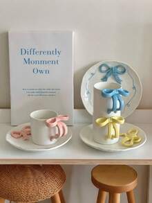 1个手工可爱小巧陶瓷马克杯，采用3D蝴蝶结设计，优雅的茶杯碟套装，适合下午茶和甜点享用。 - 彩色 - 查看 10