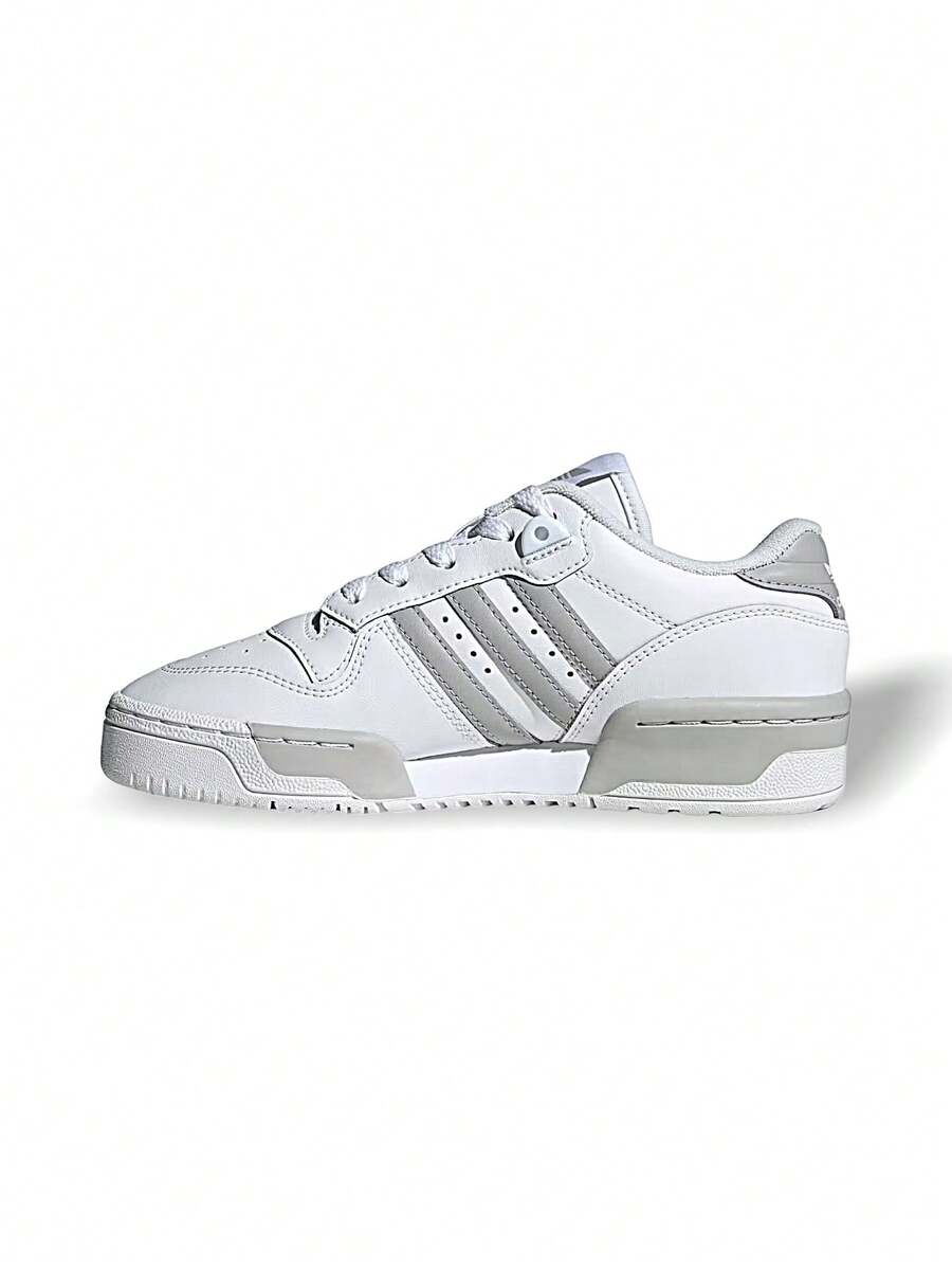 Adidas Rivalry Junior 儿童休闲运动鞋 日常上学街头健身郊游购物 轻便柔软高弹防滑鞋底 易穿脱易清洁 亲肤标志 白色/灰色 IE5785 - 白色 - 查看 1