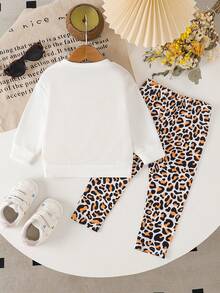 Áo dài tay họa tiết da báo trang trí nơ cho bé gái + Quần dài thường ngày họa tiết da báo toàn thân - trắng - Xem 2