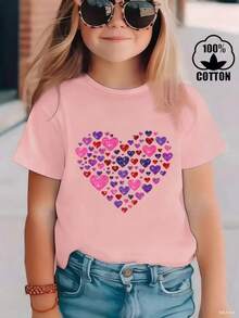 Esta elegante y nueva camiseta de manga corta para niña, 100 % algodón, luce un bonito estampado de corazones. Hecha de tela suave, esta camiseta holgada y versátil es cómoda y agradable al tacto. Ya sea para una reunión familiar, una actividad escolar o para jugar, esta camiseta permite que tu hija se mueva con libertad y comodidad. - Rosa - Ver 2