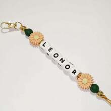 1个定制名字钥匙扣，硅胶珠定制钥匙扣礼品，背包钥匙扣，送给妈妈的礼物。色彩缤纷，可爱，萌趣，趣味十足，卡哇伊，千禧年风，时尚，男女皆宜，休闲百搭，可定制，个性化，独一无二，送给他的理想礼物，送给初中生、高中生、大学生、大一、大二、低年级学生的理想礼物，精致浪漫，实用时尚。