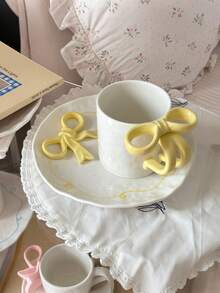 1个手工可爱小巧陶瓷马克杯，采用3D蝴蝶结设计，优雅的茶杯碟套装，适合下午茶和甜点享用。 - 彩色 - 查看 6