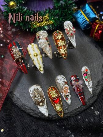 10 st handgjorda nagellack med akrylfärgade press-on-naglar, stiletto-julnaglar, röda och nakna och gröna snöflingemotiv (jul), vit och röd teckning med snöflingerosett, 3D med strass-pärlor och rosett och andra nageltillbehör, akrylnageltillbehör passar för jul- och nyårsfestivaler, dagligen, sammankomster, fester och är utmärkta presenter till kvinnor och flickor, utrustad med 1 gelépad och 1 nagelfil