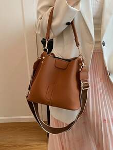 Nueva bolsa de hombro de moda para mujer, bolso cubo minimalista de unicolor de PU, bolso versátil y elegante de estilo retro de alta gama, adecuado para citas y compras