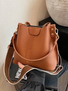 Nueva bolsa de hombro de moda para mujer, bolso cubo minimalista de unicolor de PU, bolso versátil y elegante de estilo retro de alta gama, adecuado para citas y compras