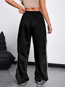 Pantalones deportivos casuales con diseño de estrella patchwork y rayas laterales estilo - Blanco y Negro - Ver 2