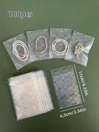 50/100 piezas Bolsas transparentes holográficas iridiscentes OPP autosellantes, bolsas para joyas, bolsas de protección para joyas, bolsas OPP transparentes con degradado de corazón, película de cartón brillante, película de protección fotocrómica de tarjeta de foto colorida