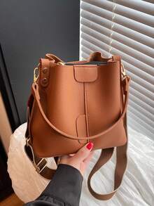 Nueva bolsa de hombro de moda para mujer, bolso cubo minimalista de unicolor de PU, bolso versátil y elegante de estilo retro de alta gama, adecuado para citas y compras